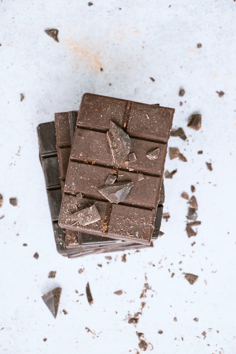 bars of chocolates stacked on top of eachover