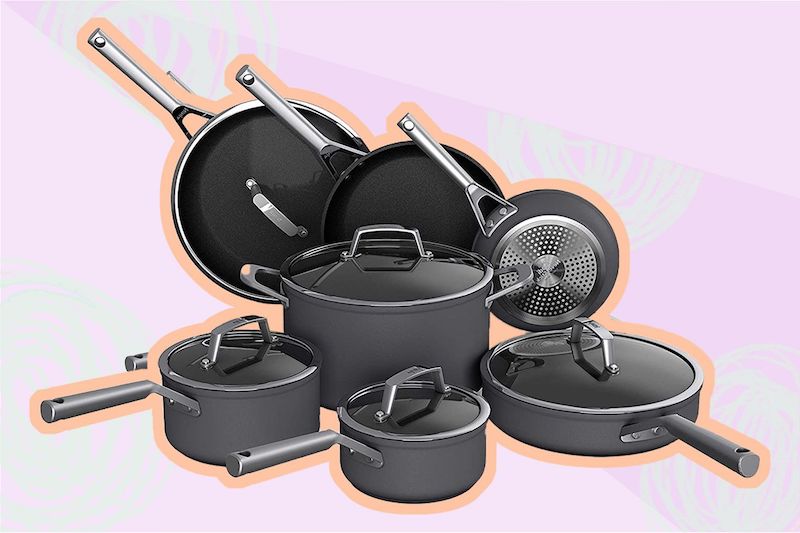 cleaning burnt pots and pans black pots on pink background