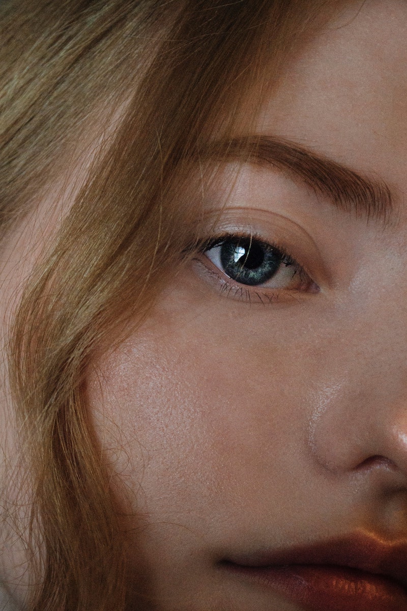 close up of girls face with clear skin