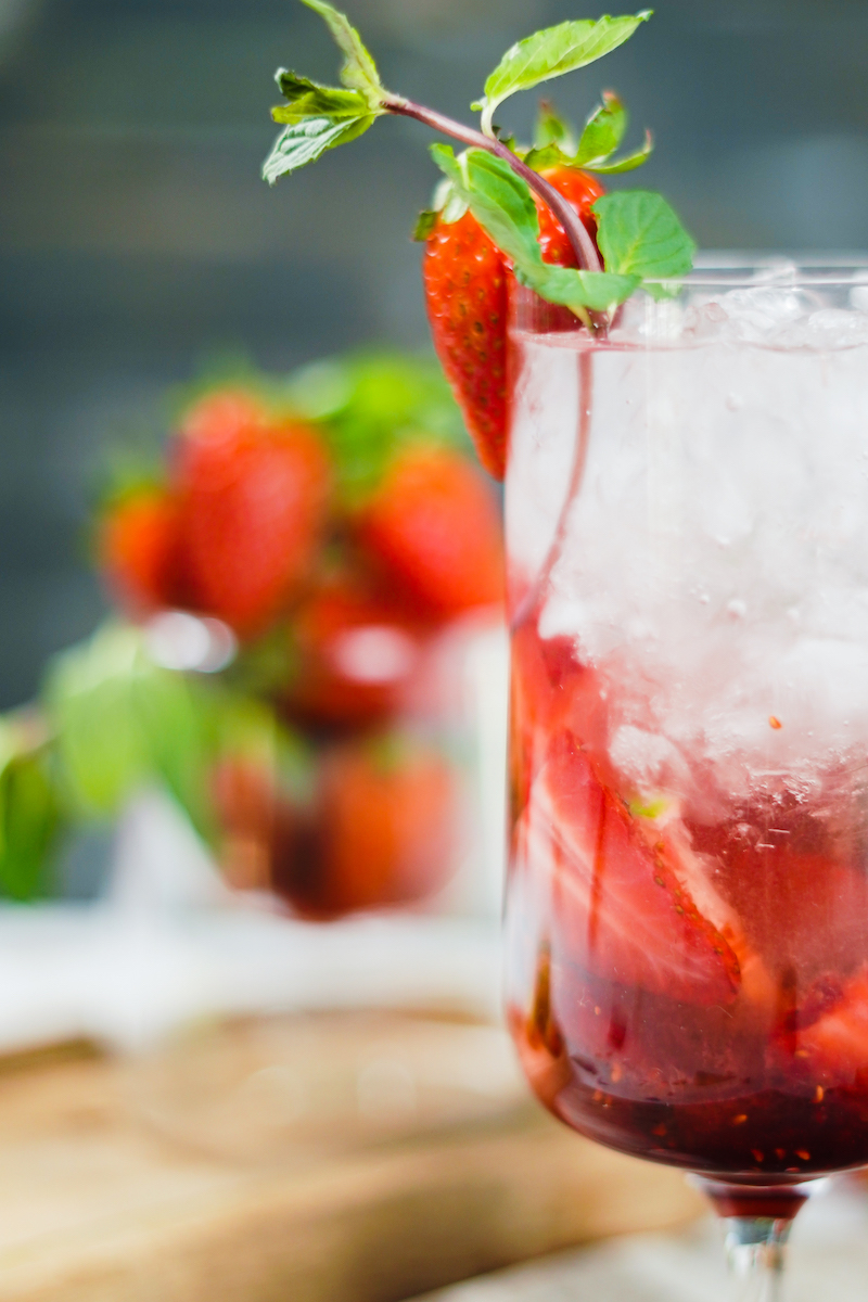 close up of strawberry mojito glass