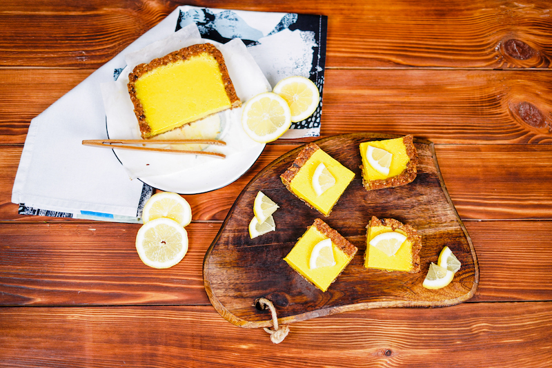 lemon bars with turmeric and oat base in slices