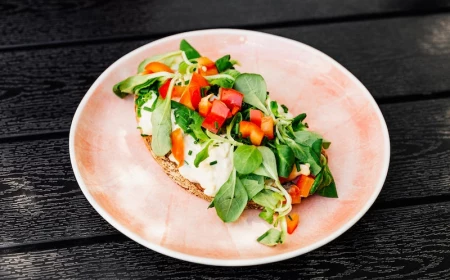 pink plate with spinach cream cheese
