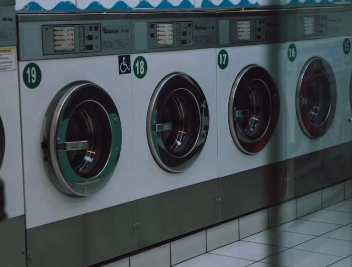 recycle old machine washing machines at a laundromat