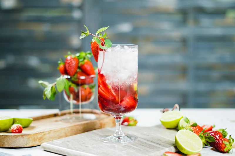 strawberry mojito recipe strawberry mohito in a glass with strawberry garnish