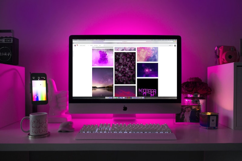 mac computer with pink backlights