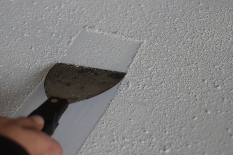 make your home look cheap scraping a popcorn ceiling