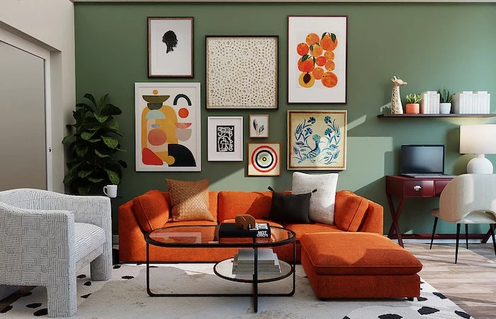 orange couch with painting on the wall