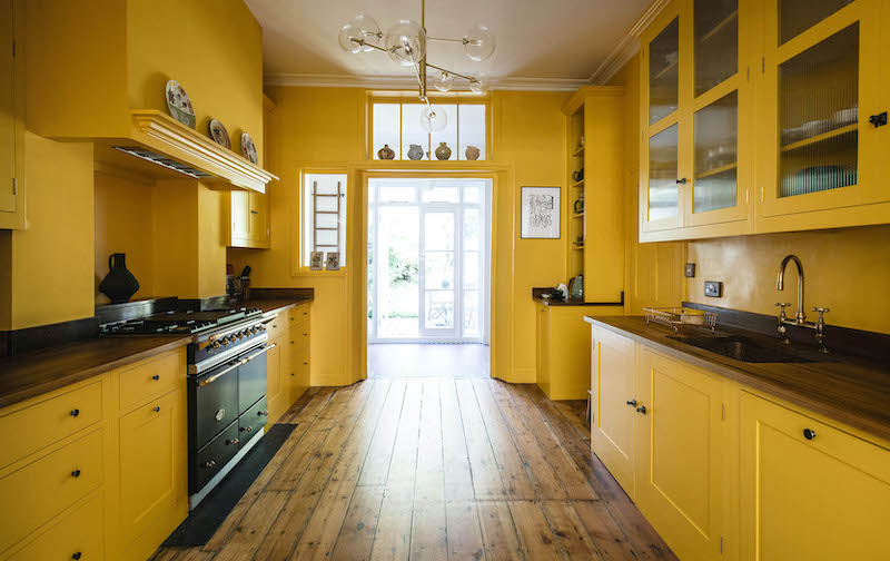 paining your kitchen bright yellow kitchen