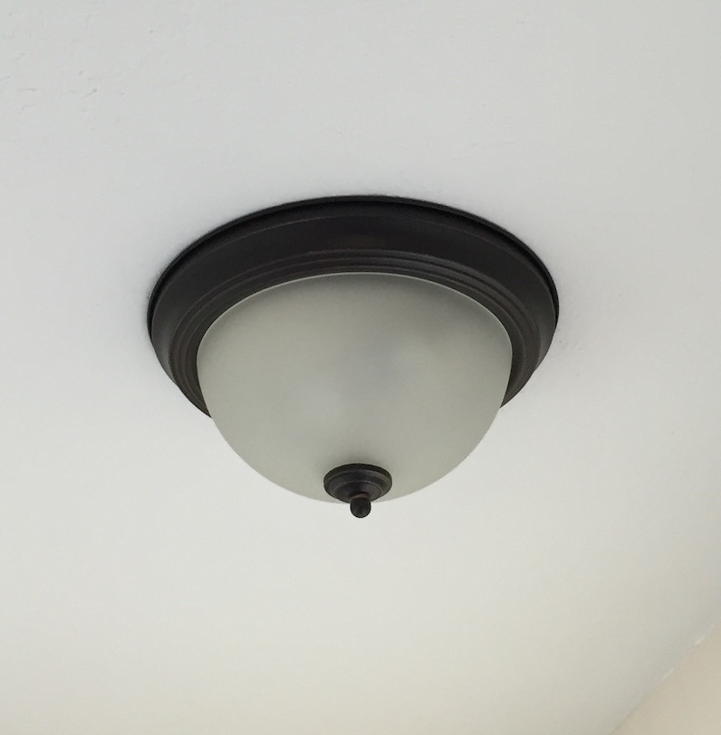 things that make your home look cheap ceiling lighting basic light fixture