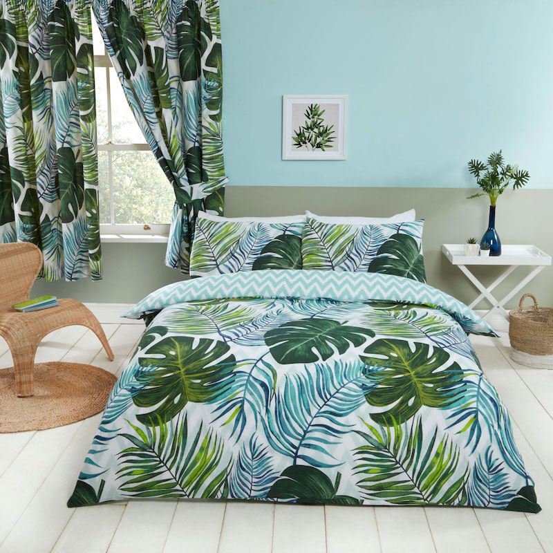 tropical themed bedroom with palm furniture