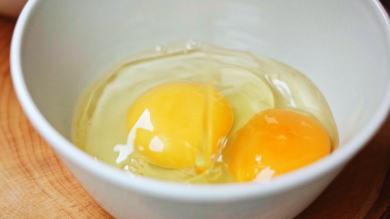 two eggs cracked in a bowl