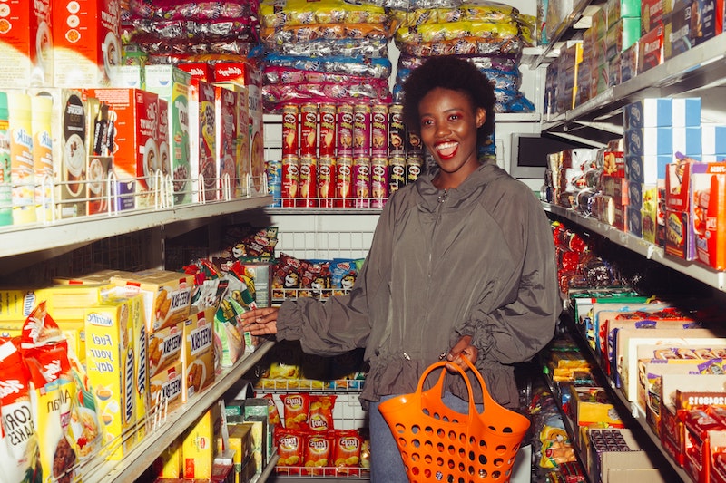 woman in the snack isle of shop