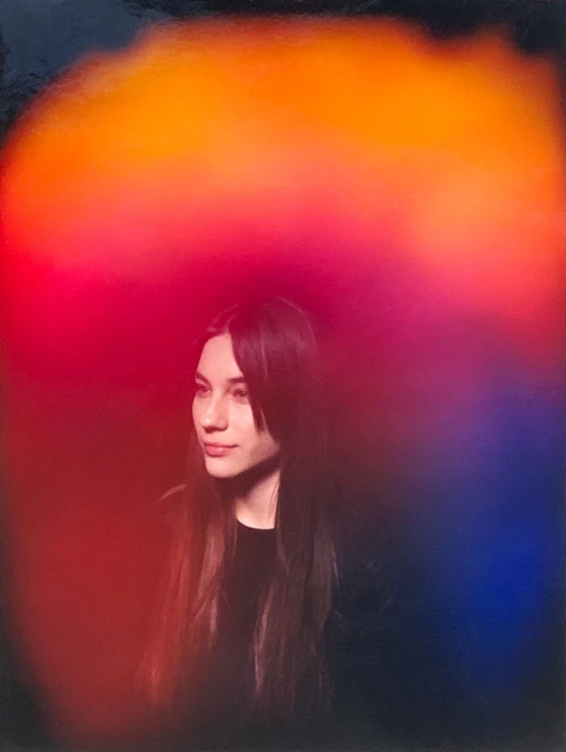 woman with pink and orange aura