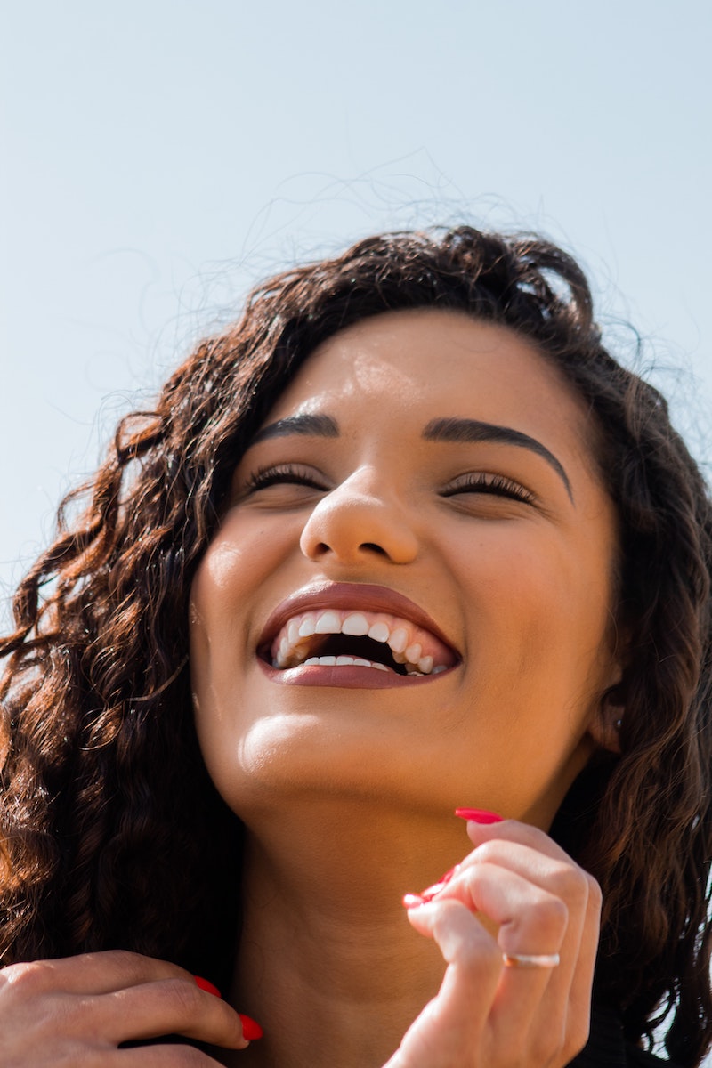 beautiful teeth woman smiling and laughing