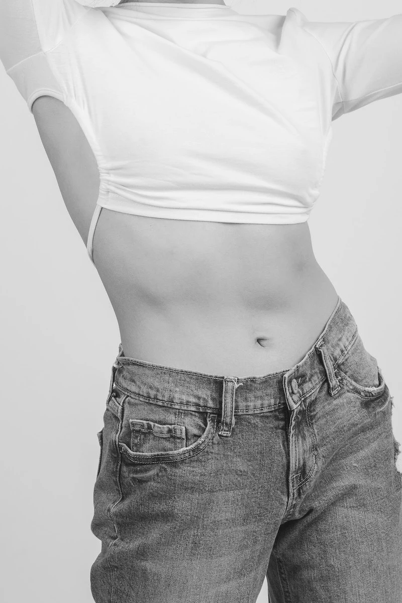 black and white picture of woman stomach