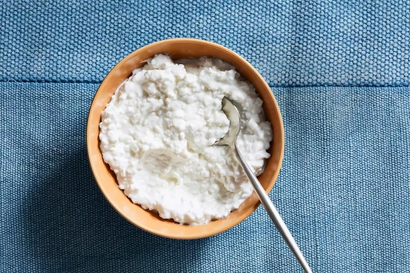 bowl of cottage cheese with spoon