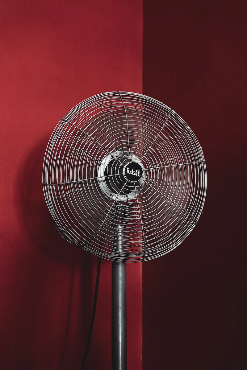 electircal fan on red background