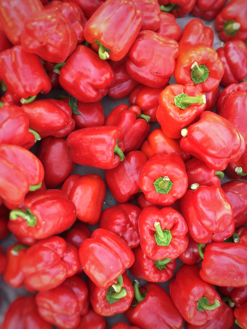 foods that give you a tan red bell peppers in a bunch