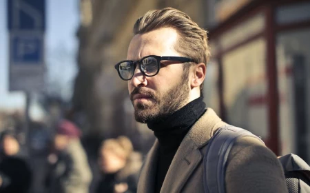 handsome man with glasses and hair