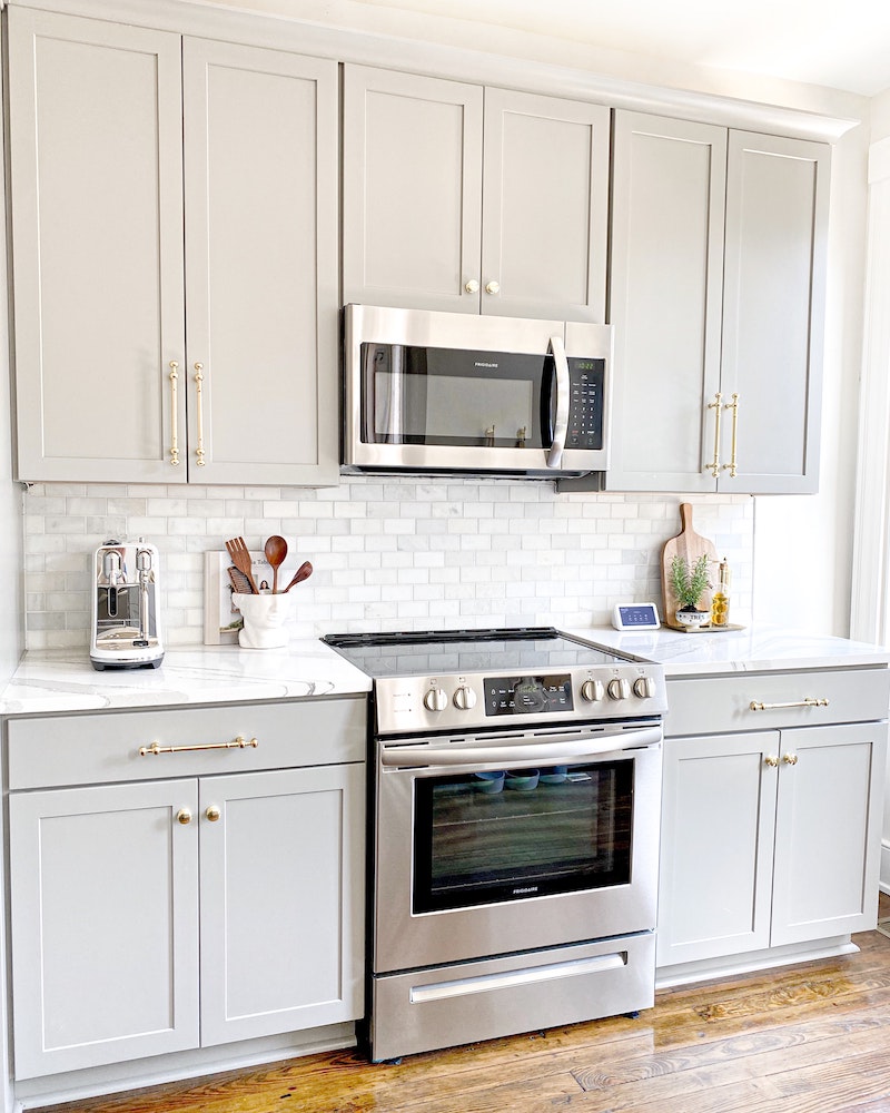 kitchen with oven and microvawe in white