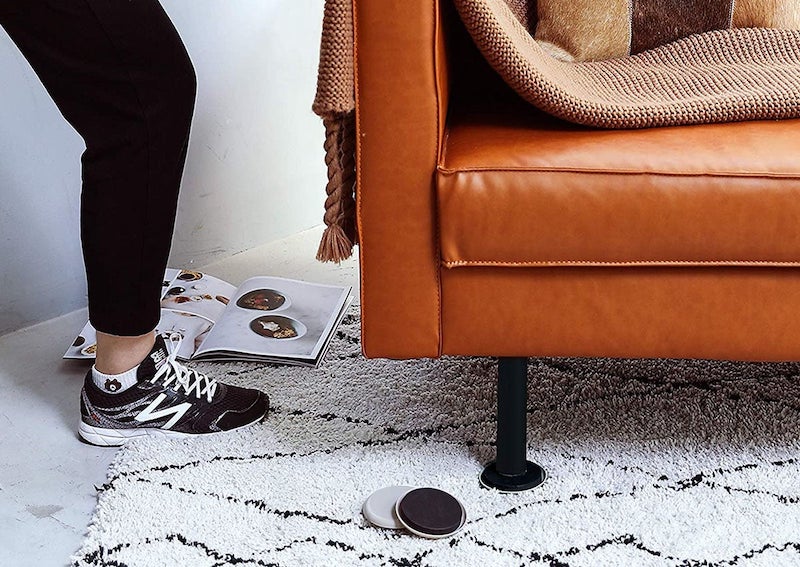 moving furniture circle sliders under the couch