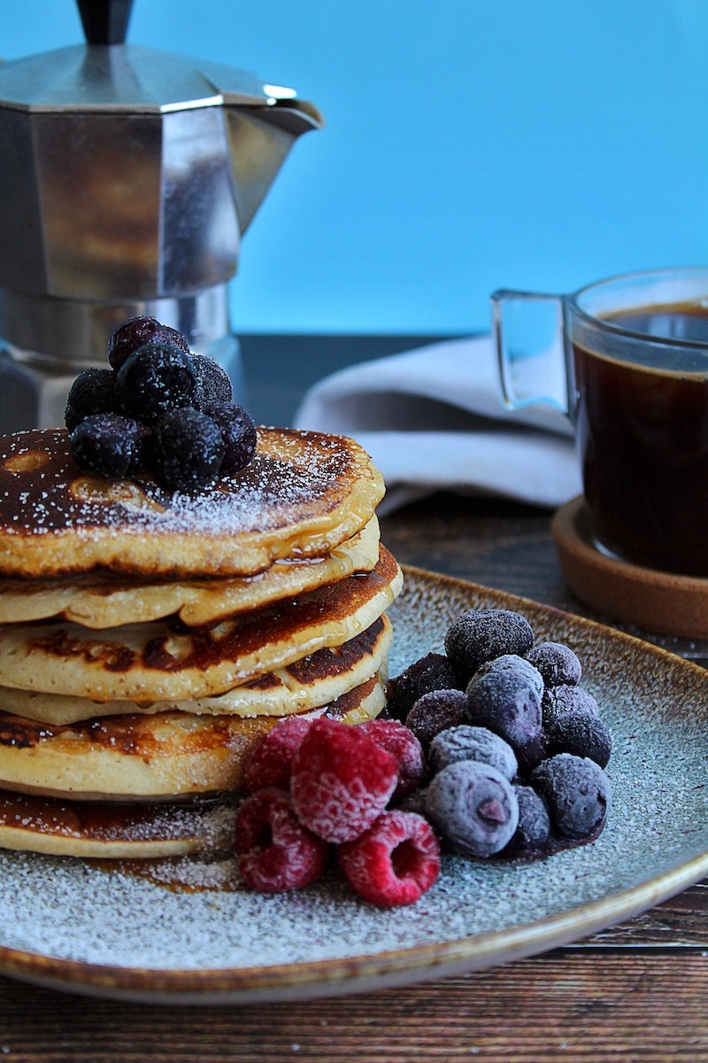 pancakes with berries and coffee