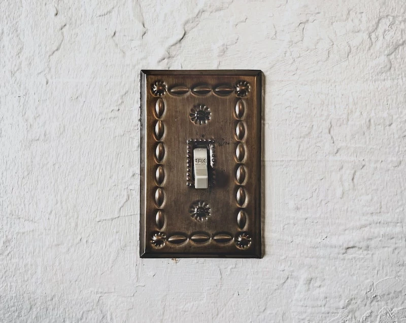 places in your home brass light switch with pattern