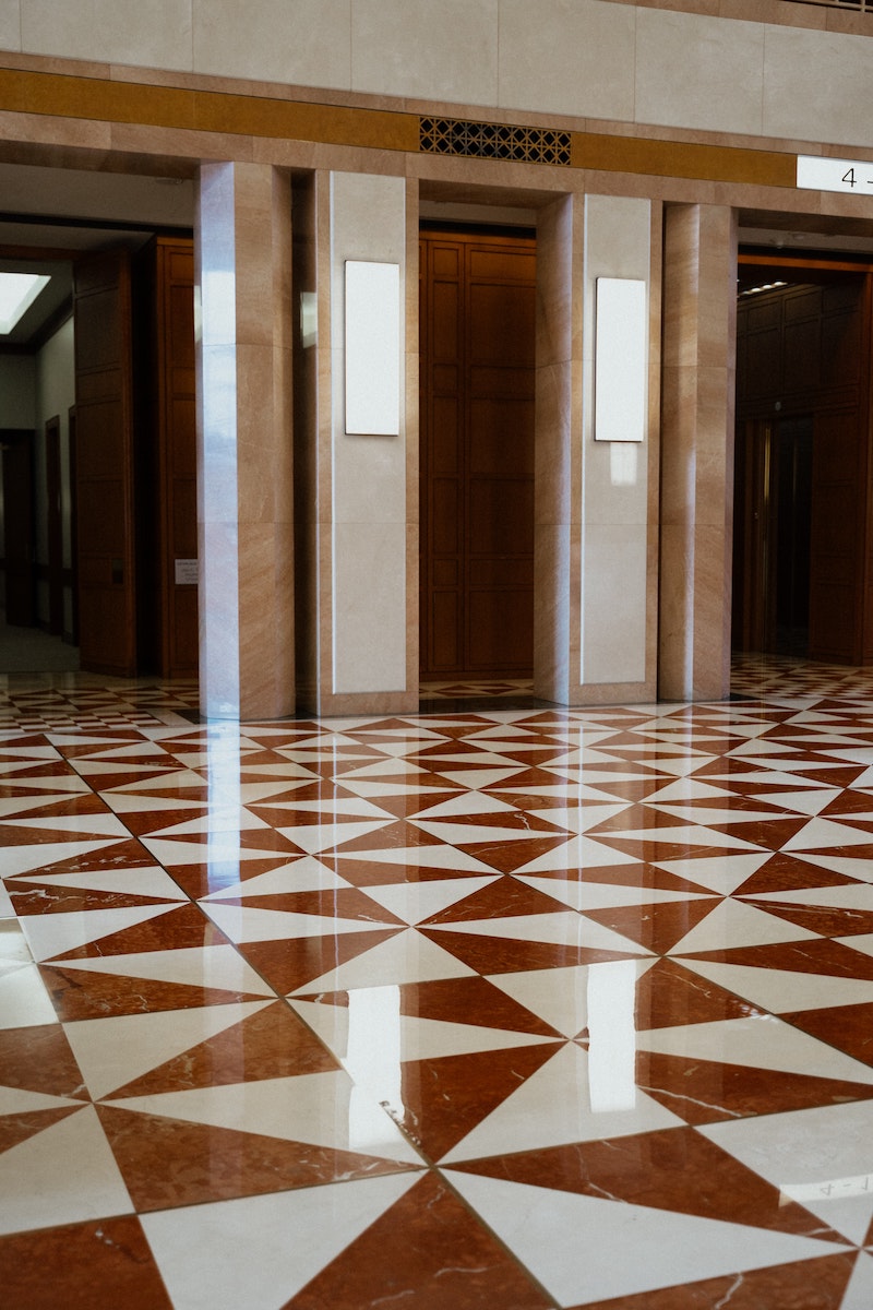 red brown and white tiles on floor