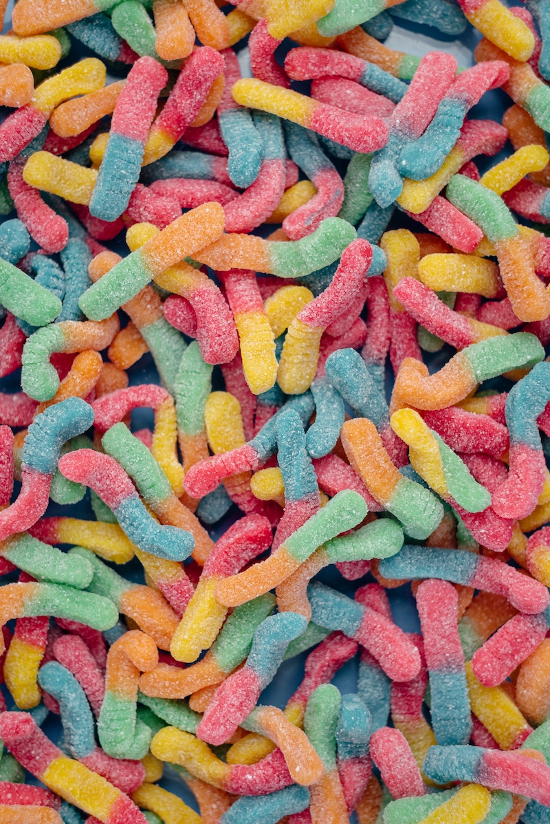 sour candy gummy worms in a bunch