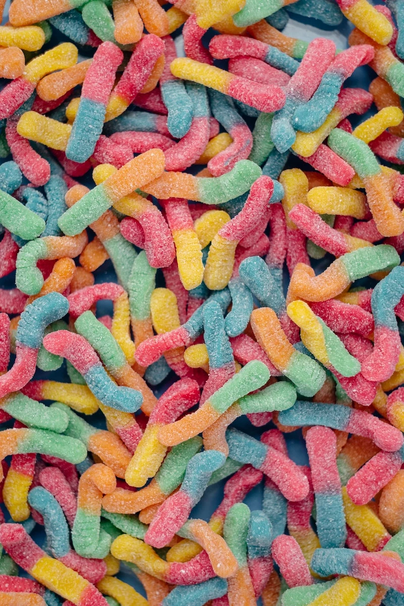 sour candy gummy worms in a bunch