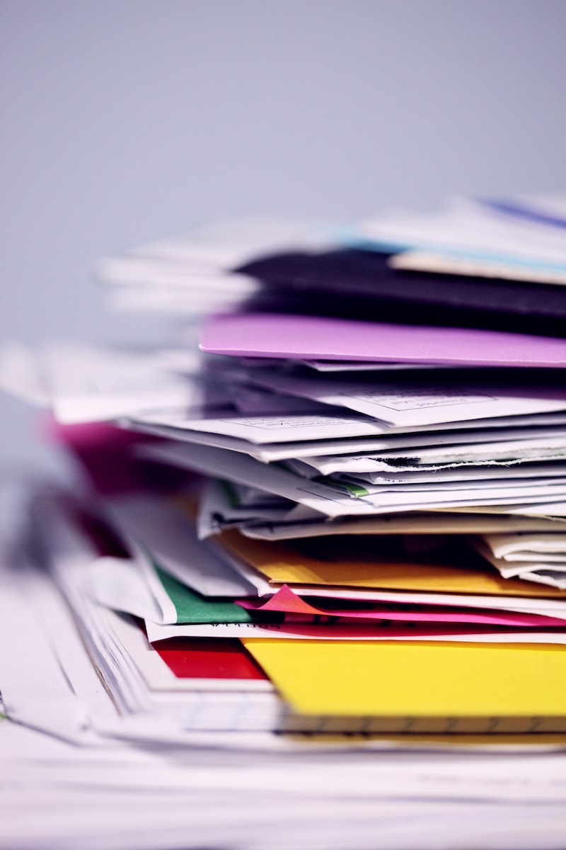 decluttering mistakes stack of papers and files