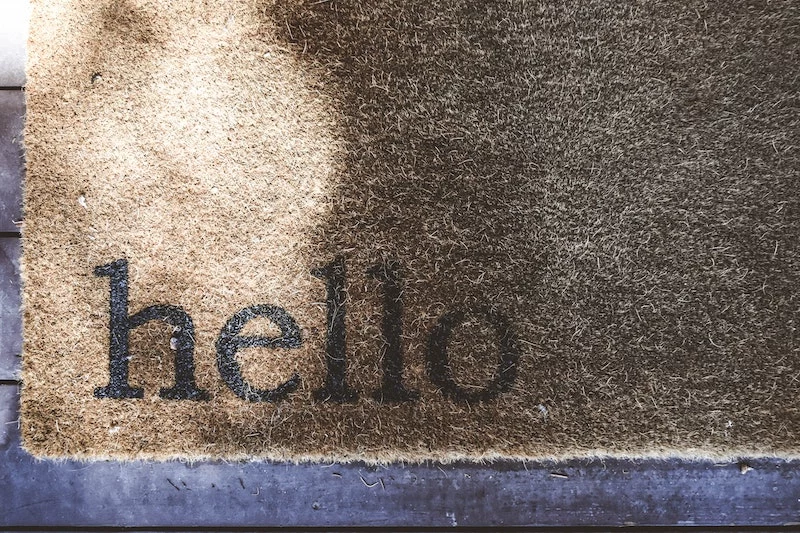 doormat that says hello on it