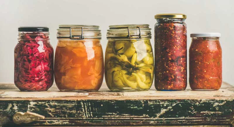fermented foods in different glass jars