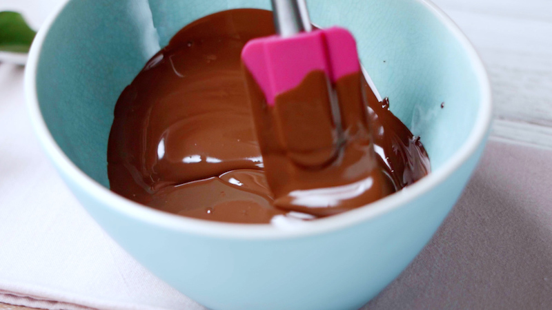melted chocolatre and pink spatula