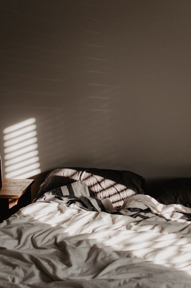 messy bed sheets on the bed
