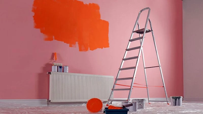 pink wall with big orange blob of paint