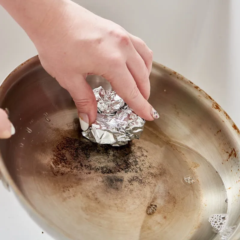 bowl of aluminum foil for scrubbing pans