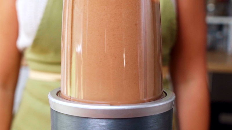 brown mixture liquid in a blender
