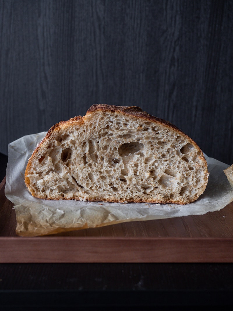 cut in half loaf of sourdough bread