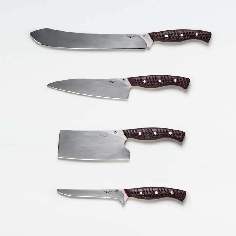 four types of knives on white background