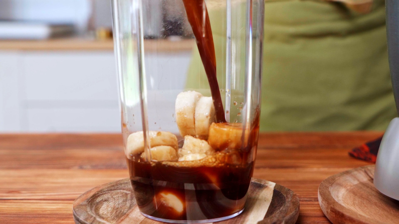 frozen banana and coffee in a blender