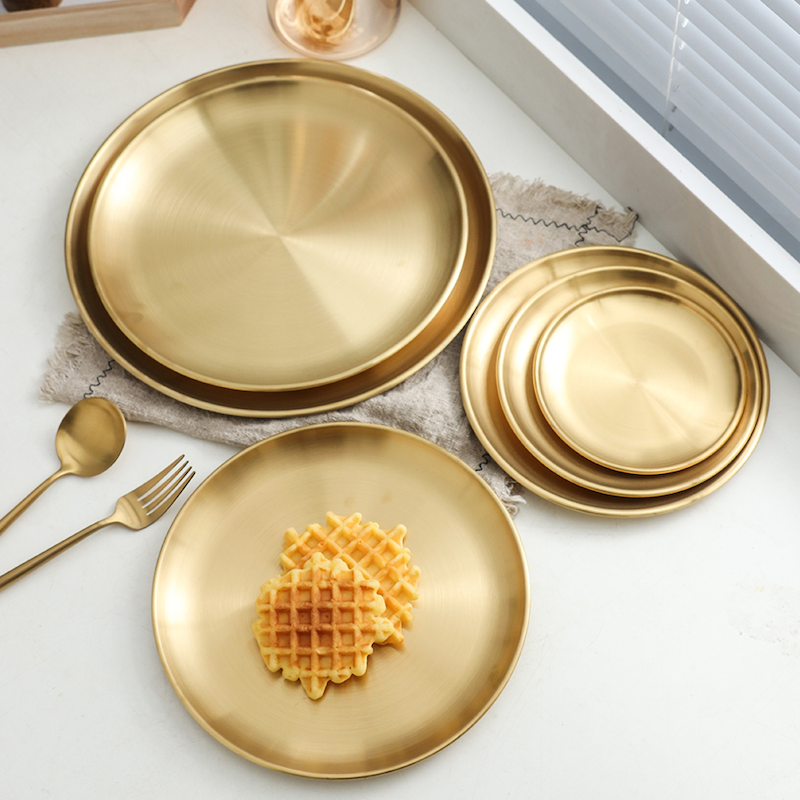 gold plated plates with a waffel on them