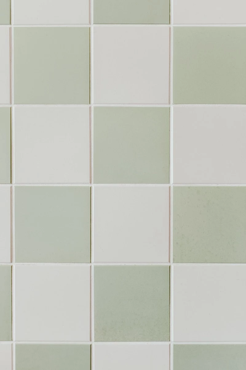 green and white tiles in room