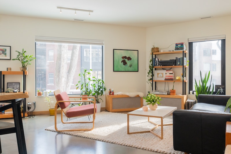 living room with couch and two chairs