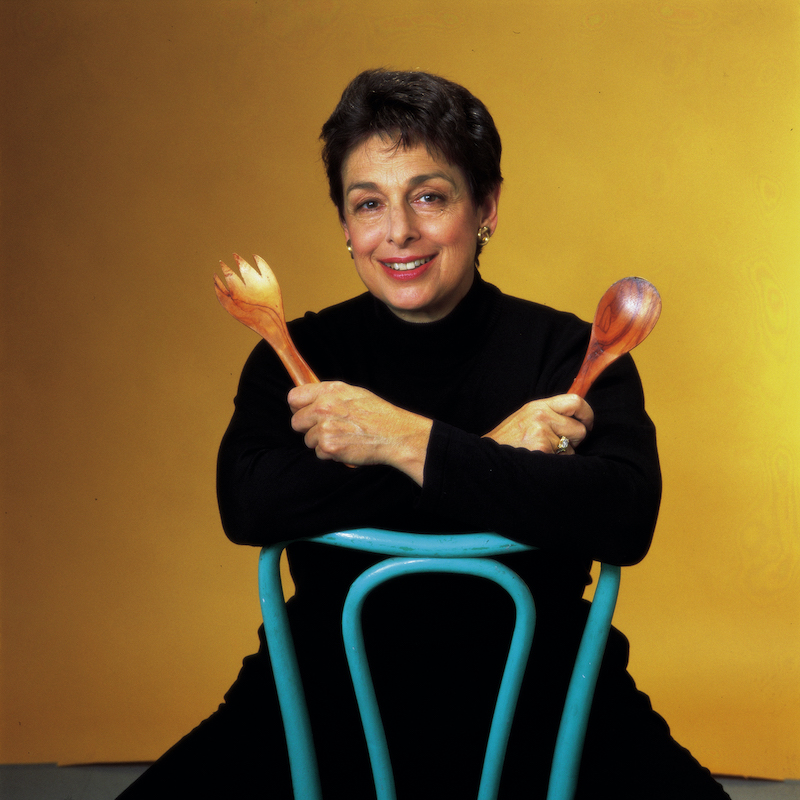 mariam burros holding two utensils