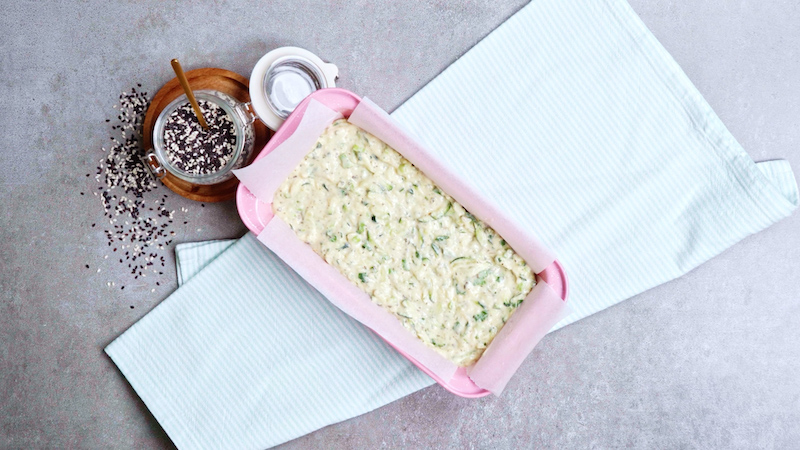 zucchini savory bread mixture in loaf pan