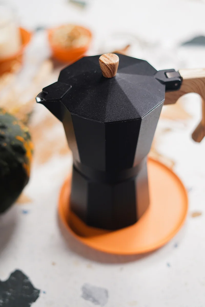 black coffee pot with espresso