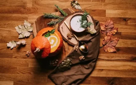 creamy vegan pumpkin soup in a carved out pumpkin