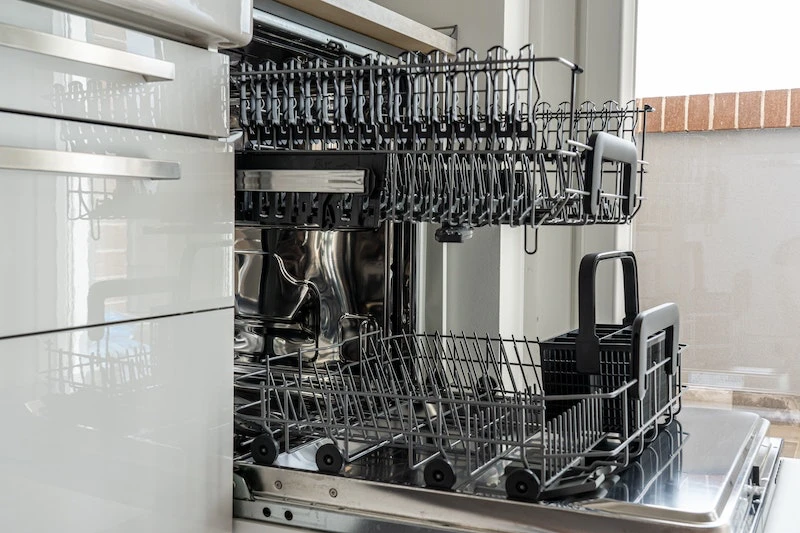 empty dishwasher with racks out
