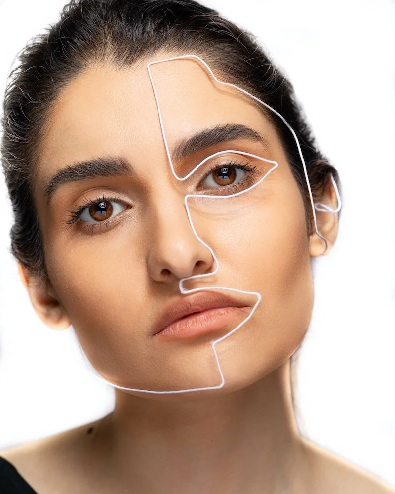 facial exercises woman with a white outline of face
